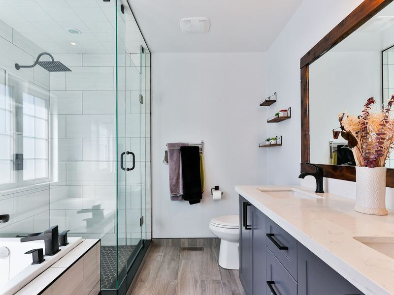 Renovated bathroom with new fixtures, tiling and vanity