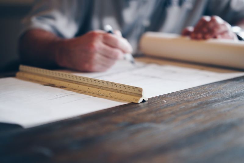 Product specifications and technical plans reviewed before a client campaign